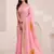 Women baby pink & orange floral printed linen silk blend saree