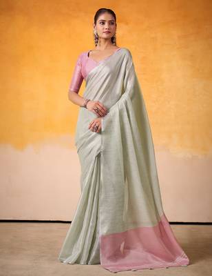 mint green & pink solid tissue linen saree with zari border 1