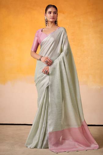 mint green & pink solid tissue linen saree with zari border