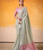 mint green & pink solid tissue linen saree with zari border