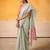 mint green & pink solid tissue linen saree with zari border
