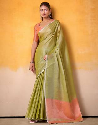 lime green & peach-coloured solid tissue linen saree with zari border 1