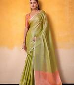 lime green & peach-coloured solid tissue linen saree with zari border