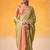 lime green & peach-coloured solid tissue linen saree with zari border