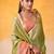lime green & peach-coloured solid tissue linen saree with zari border