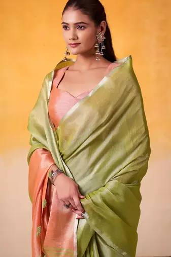 lime green & peach-coloured solid tissue linen saree with zari border