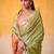 lime green & peach-coloured solid tissue linen saree with zari border