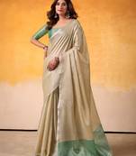 beige & sea green solid tissue linen saree with zari border