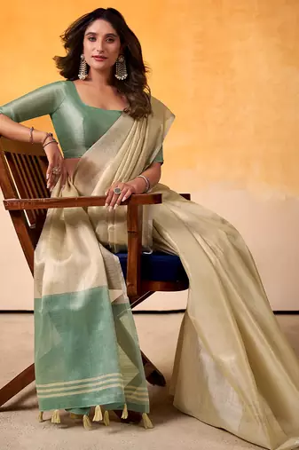 beige & sea green solid tissue linen saree with zari border