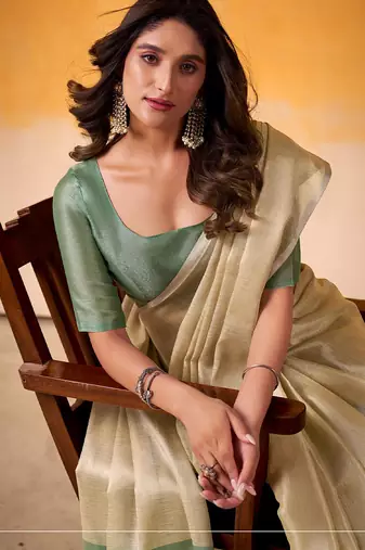 beige & sea green solid tissue linen saree with zari border