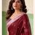Women maroon woven design linen saree with silver zari