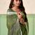 Women olive green woven design linen saree with silver zari