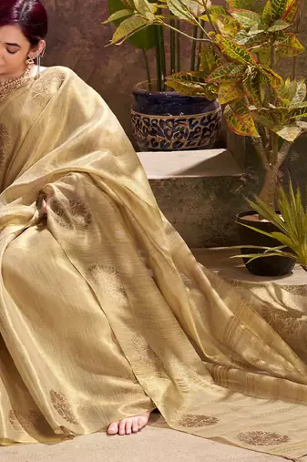 golden beige woven tissue silk blend saree with mandala motifs