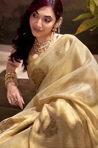 golden beige woven tissue silk blend saree with mandala motifs