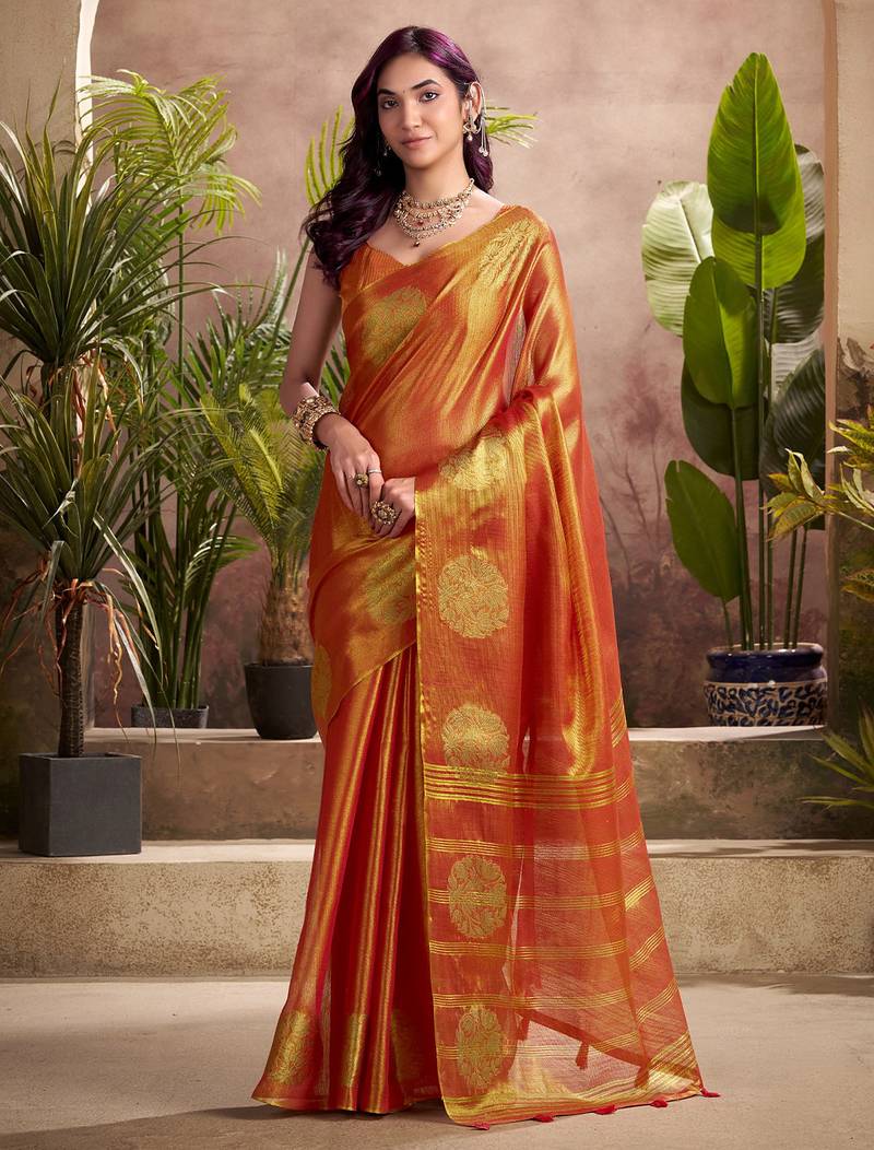 rust orange woven tissue silk blend saree with mandala motifs