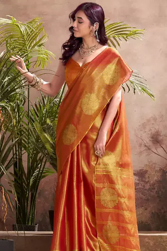 rust orange woven tissue silk blend saree with mandala motifs