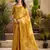mustard yellow woven tissue silk blend saree with mandala motifs
