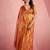 rust orange woven tissue silk blend saree with mandala motifs