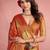 rust orange woven tissue silk blend saree with mandala motifs