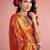 rust orange woven tissue silk blend saree with mandala motifs