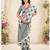 Women sage green & grey checked linen saree with floral pallu