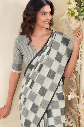 Women sage green & grey checked linen saree with floral pallu
