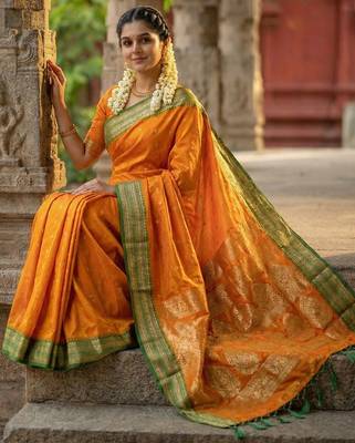 The sunset glow: vibrant orange soft silk blend saree with contrast green zari border 2