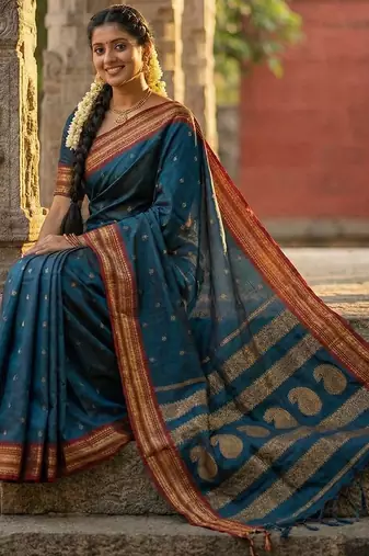 The peacock hue: teal blue soft silk blend saree with contrast red zari border