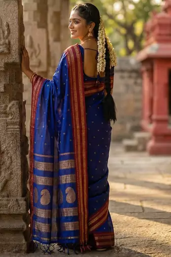 The peacock hue: blue soft silk blend saree with contrast red zari border