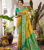 Mustard yellow banarasi silk blend saree with sea green border for haldi & festivals