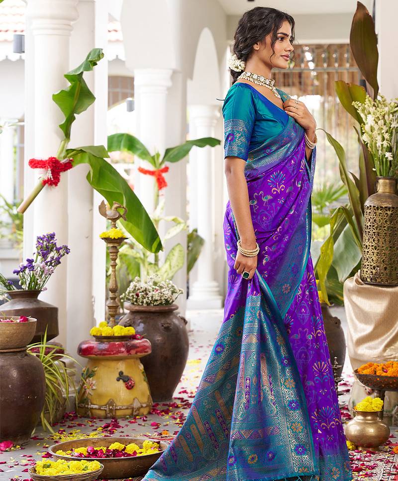 Royal purple banarasi silk blend saree with teal blue contrast border & zari work