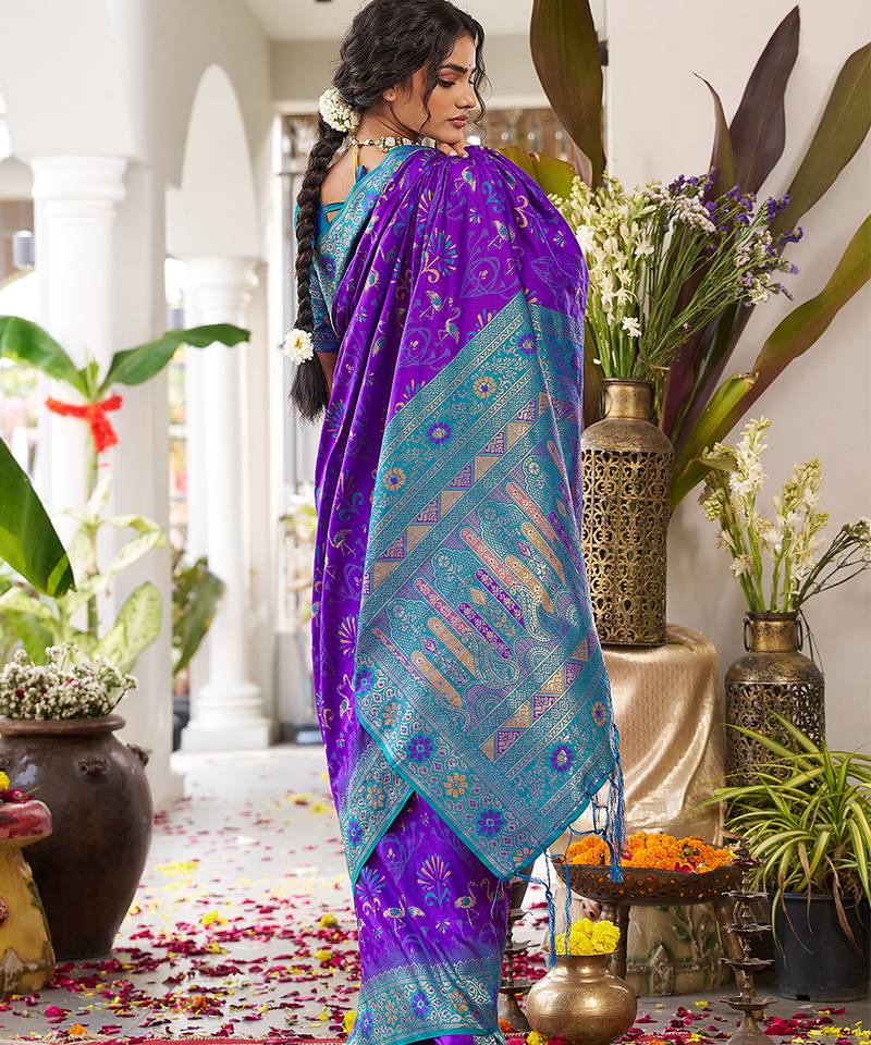Royal purple banarasi silk blend saree with teal blue contrast border & zari work