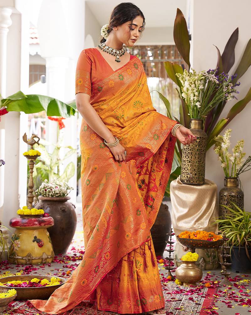 Bright orange banarasi silk blend saree with red border for wedding & festive wear