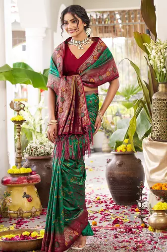 Emerald green banarasi silk blend saree with maroon border & gold zari weaving