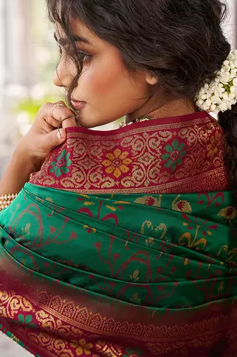 Emerald green banarasi silk blend saree with maroon border & gold zari weaving