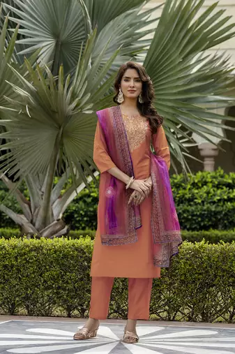 Orange color rayon sttiched straight suit