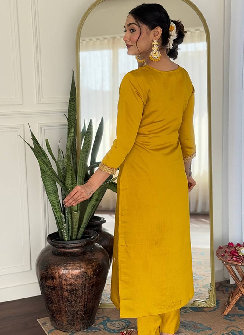Yelllow color rayon embroidered straight suit