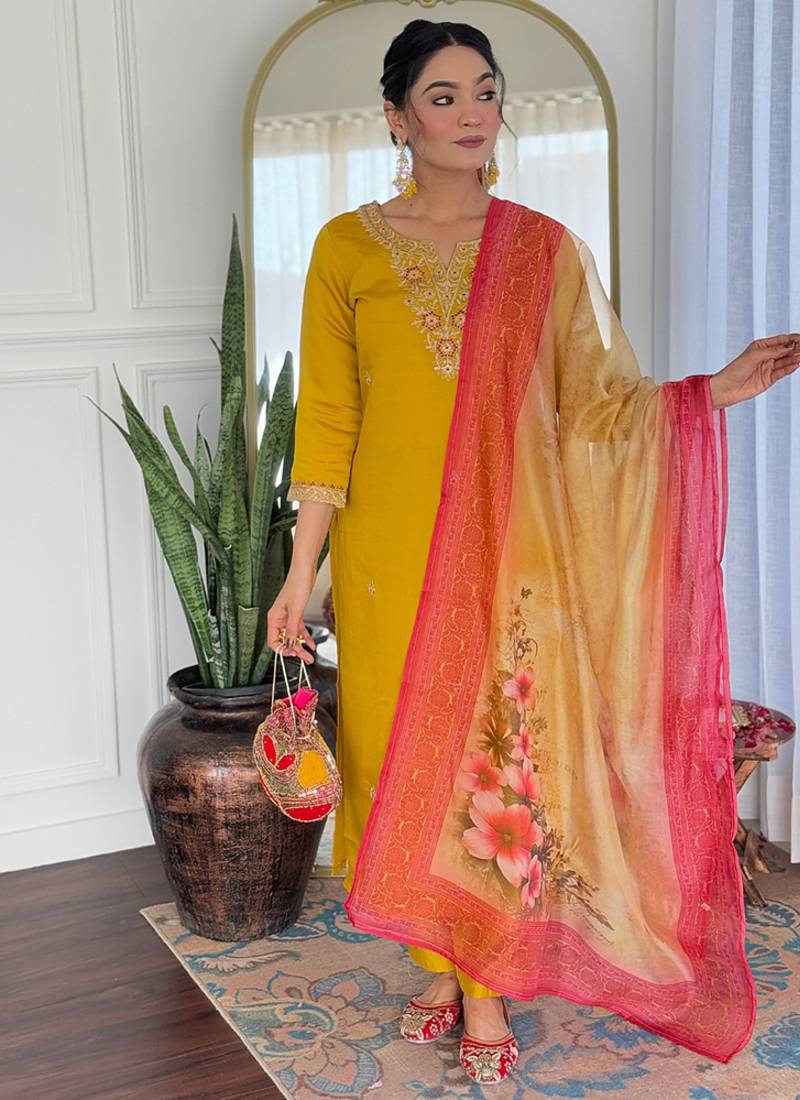 Yelllow color rayon embroidered straight suit