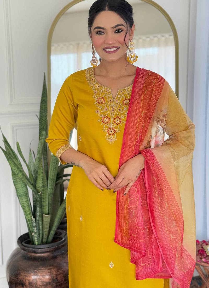 Yelllow color rayon embroidered straight suit