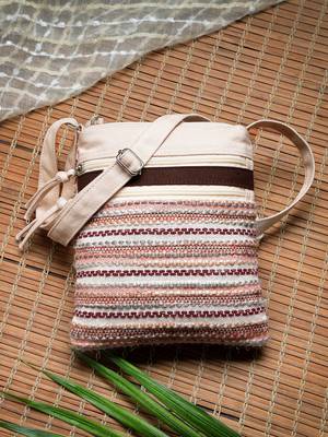 pink canvas sling bag with striped pattern 1