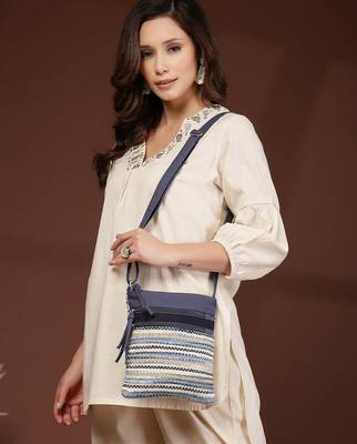 blue acrylic sling bag with striped pattern 3