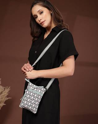 teal canvas sling bag with geometric print 3