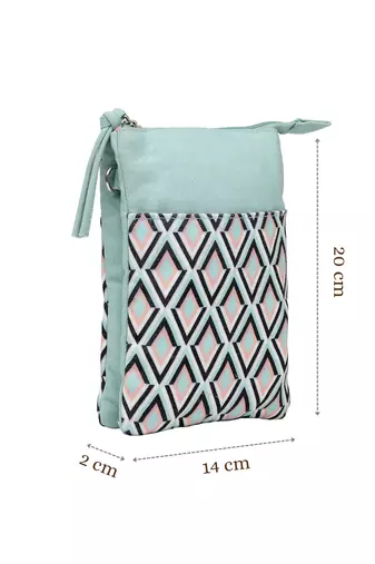 teal canvas sling bag with geometric print