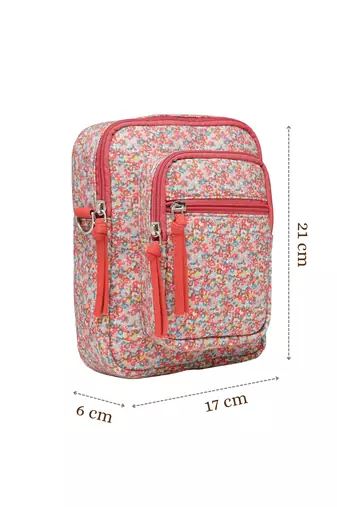 red canvas sling bag with floral print