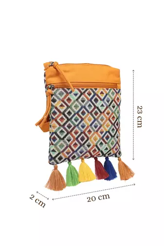 mustard canvas sling bag with geometric design