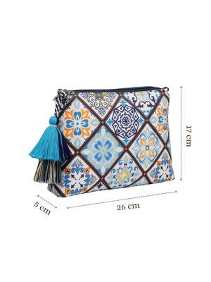 blue canvas sling bag with geometric print 5