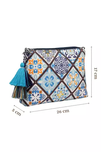 blue canvas sling bag with geometric print