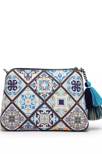 blue canvas sling bag with geometric print