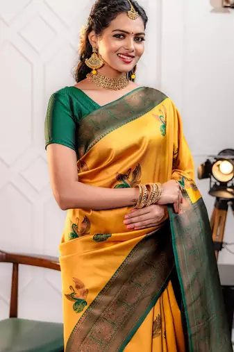green gold silk blend banarasi saree with unstitched blouse piece