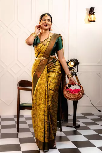 yellow silk blend banarasi saree with unstitched blouse piece